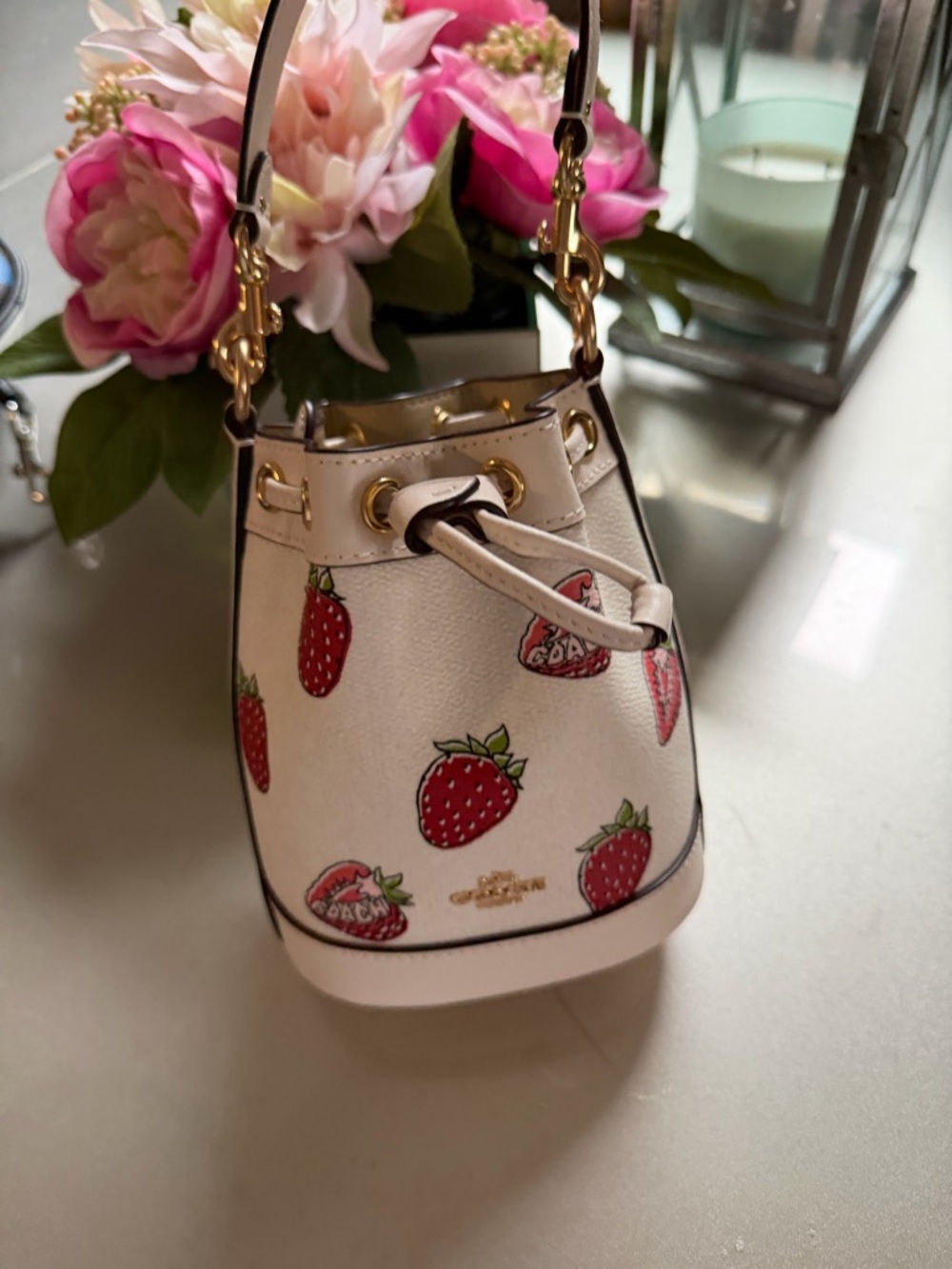 Coach White Mini Drawstring Bucket Bag with Strawberry Print
